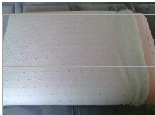 Almohada de núcleo viscoelástico rosa.